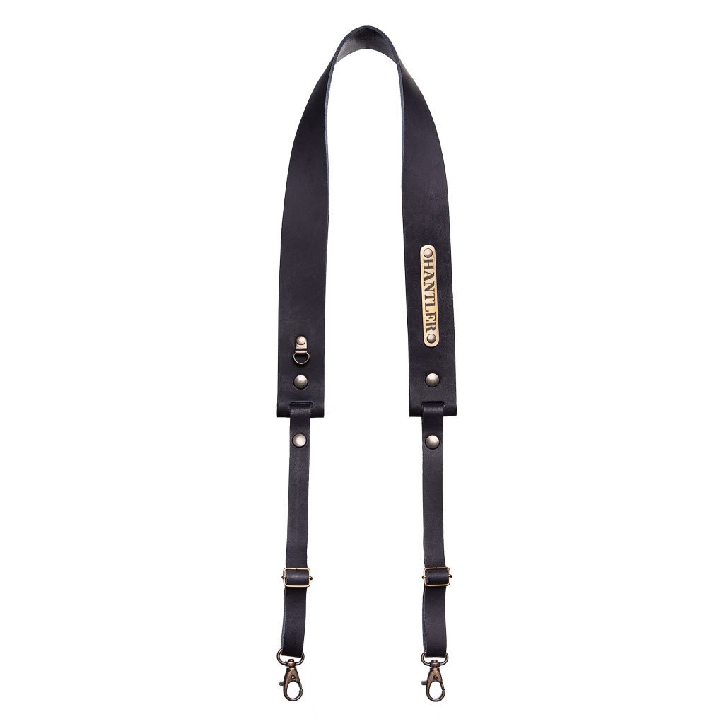 The Hantler's handmade black leather neck strap wich can be personalized with your own name on the metal tag.